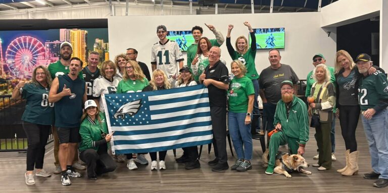 Philadelphia Eagles fans with an Eagles flag at the Pin Point Philadelphia Eagles Bar in Little River SC near Myrtle Beach