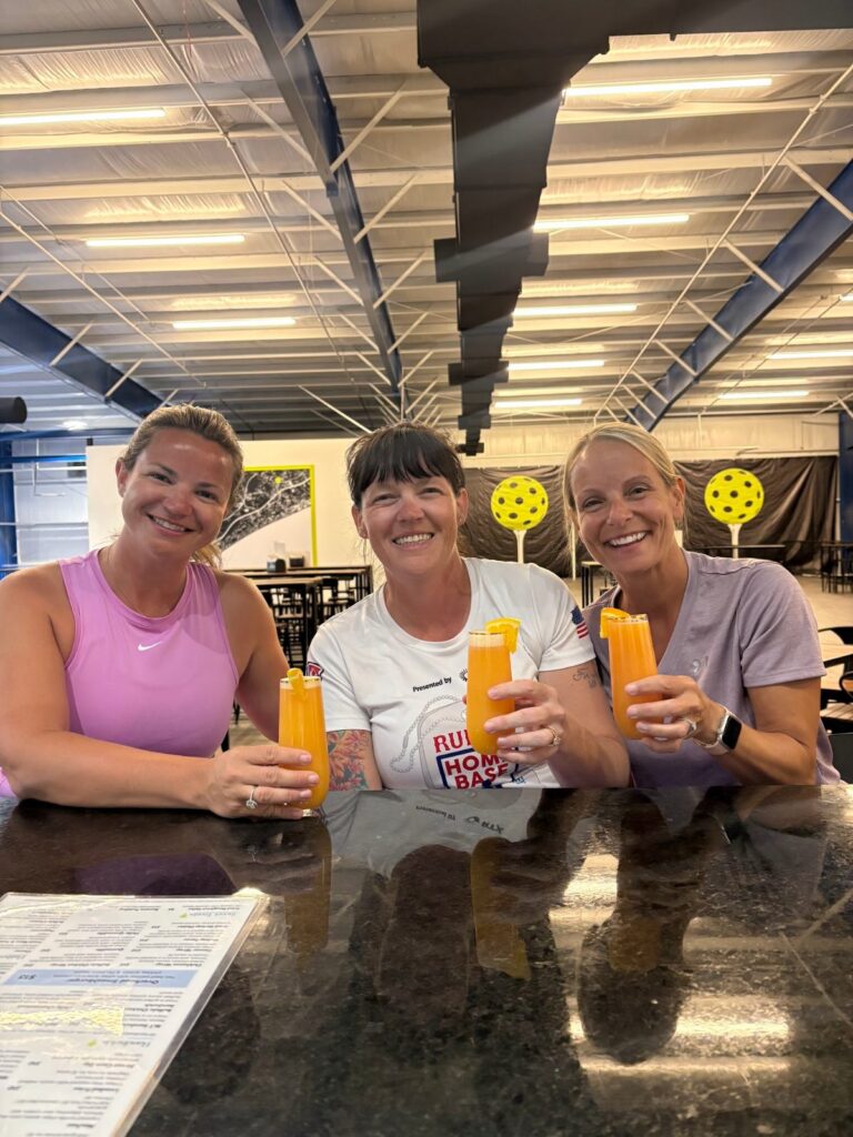 Friends enjoying drinks at the Pin Point bar in Little River SC